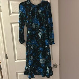 Black floral dress midi length. Flowy silk fabric